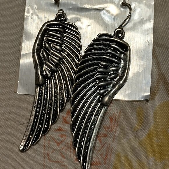 Long alluring  angel wings earrings no discount's given prices are low enough - Picture 1 of 1
